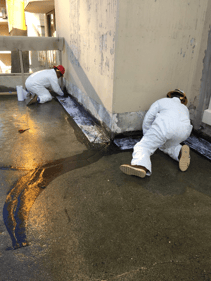 Reinforcing fabric in a wall to floor